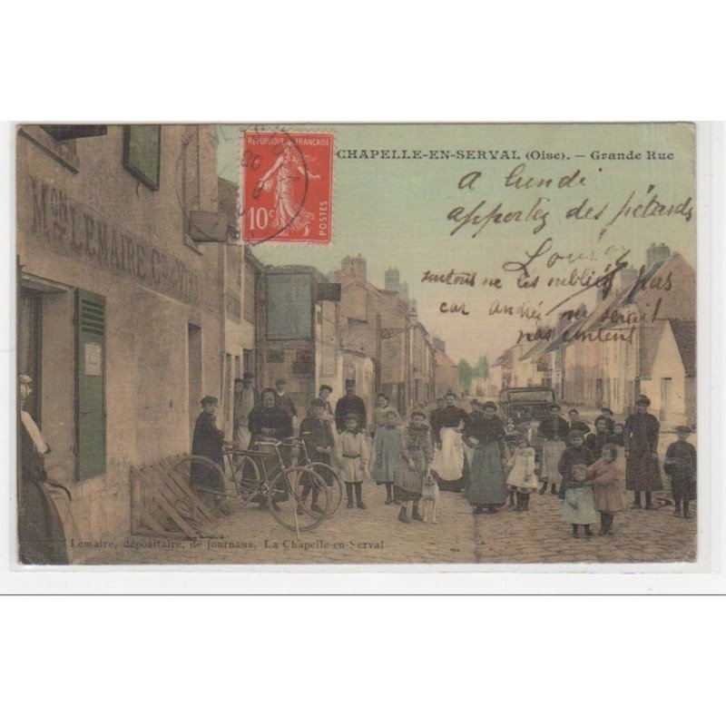 LA CHAPELLE EN SERVAL : la grande rue (très animée) (édition toillée) - très bon état