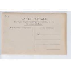 FRANCE: personnage devant un commerce(?) - très bon état