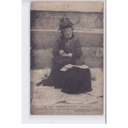 Les gagne petits, l'artiste de rue, "qui veut mes cartles dessinées" Bloch et Hallary - (état partiellement décollée)