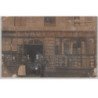 CAEN : carte photo du magasin de sacs et baches CAUVIN-YVOSE vers 1910 - état (un gros plis)