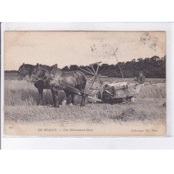 EN BEAUCE: une moissonneuse-liseuse - état