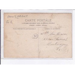 MONTMAGNY: batiment, femme à la fenêtre - très bon état