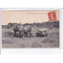 EN BEAUCE: une moissonneuse - état