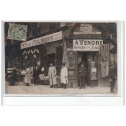 PARIS : carte photo de marchands de tapis (magasin)  - bon état (froissure)