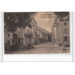 MOLOMPIZE - La rue principale - la fontaine et le pont - très bon état