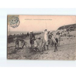 DONVILLE : Les jeux de sable sur la plage - état