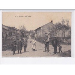 LA BAFFE: a la croix - très bon état