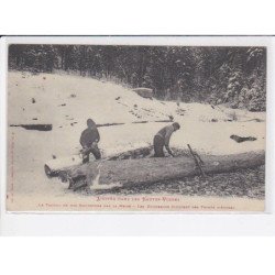 SAINT-DIE: l'hiver, le travail de nos bucherons par la neige, écorcent des troncs d'arbres - très bon état