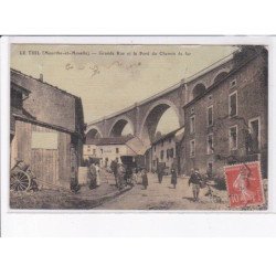 LE THIL: grande rue et le pont du chemin de fer - état