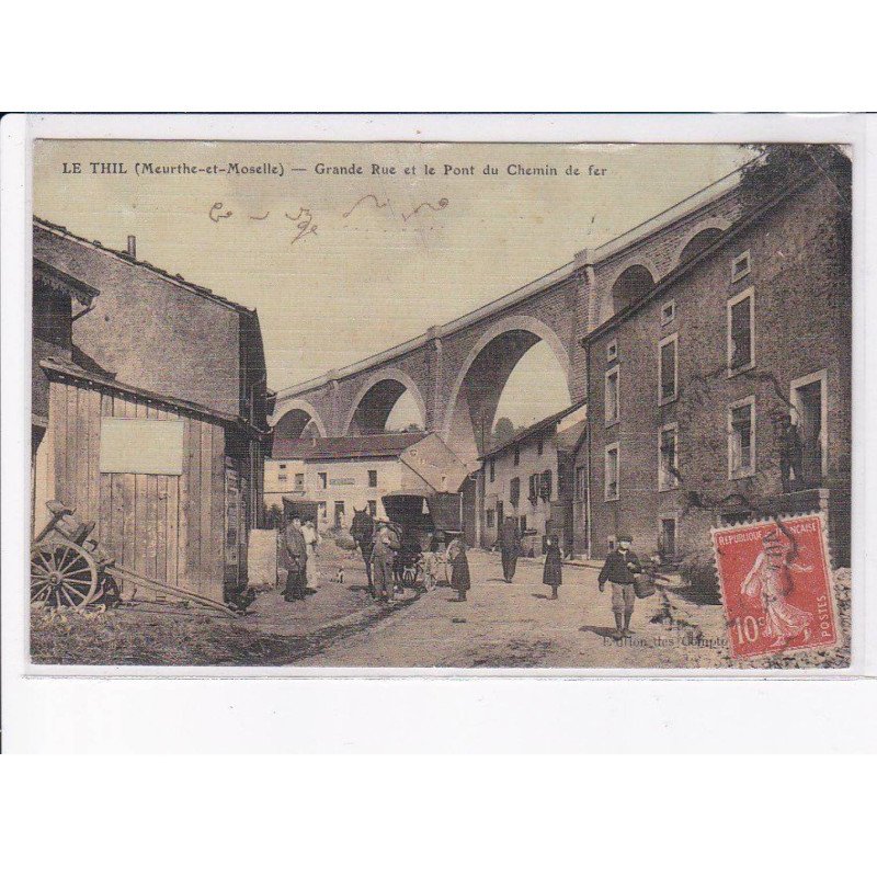LE THIL: grande rue et le pont du chemin de fer - état