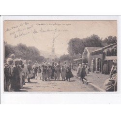 ALGERIE: AIN-ABID: rue principale, côté église