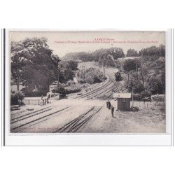 LAIGLE : passage a niveau, route de la ferté-fresnel, arrivée de l'express granville paris - tres bon etat