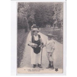 LYON: place de la tête-d'or, le marchand de coco - état