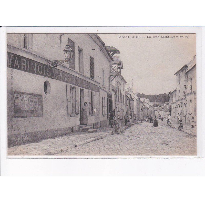 LUZARCHES: la rue saint-damien, maison de vins et liqueurs - très bon état