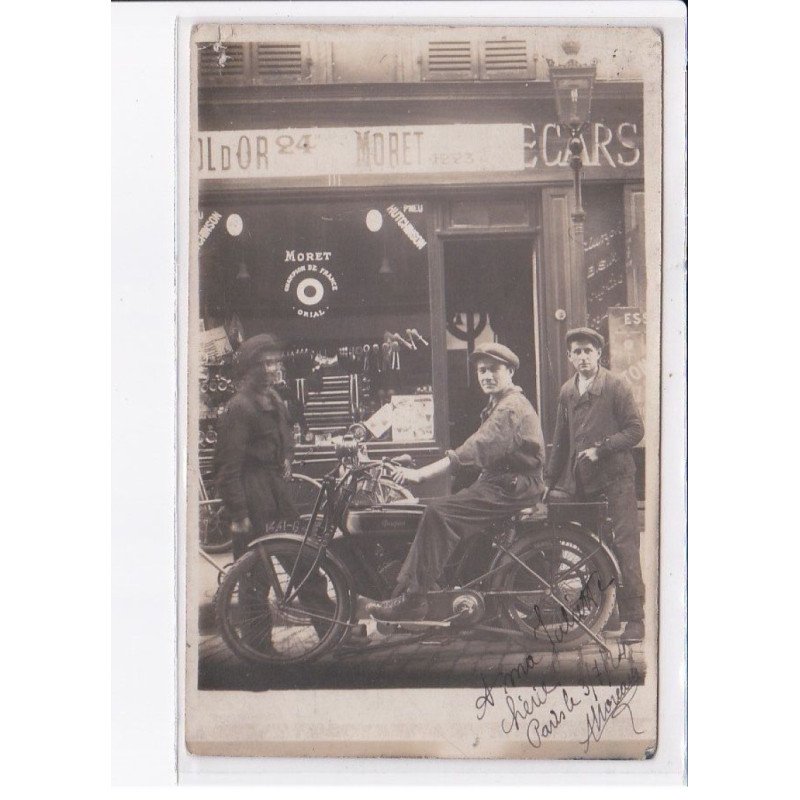 PARIS (?): moto peugeot, garage - état