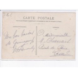 GUINGAMP: raccommodeur de parapluies, place du centre - très bon état