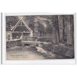 MAGNY-en-VEXIN : ancien lavoir sur l'aubette - tres bon etat