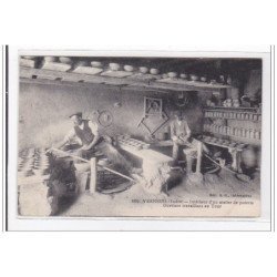 VERNEUIL : intérieur d'un atelier de poterie, ouvriers travaillant au tour - tres bon etat