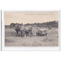 EN BEAUCE : une moissonneuse-lieuse - tres bon etat