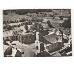 LATOUR-D'AUVERGNE: l'église et les ruines du château vue aérienne 10x15 - très bon état