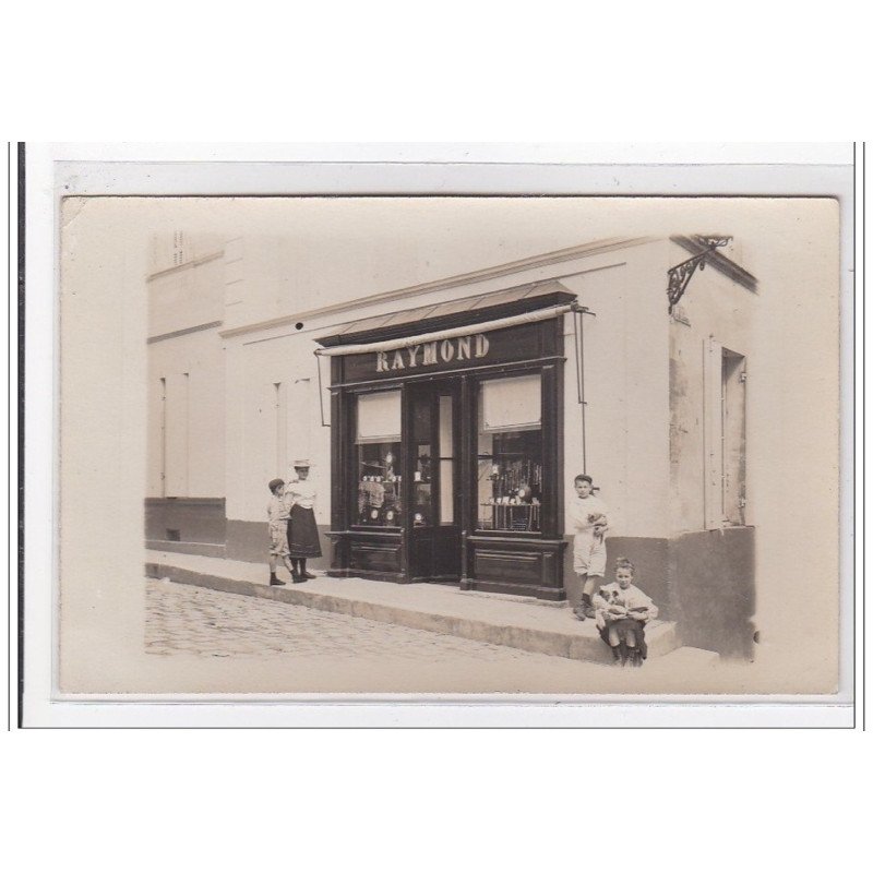 GUITRES : carte photo de la bijouterie horlogerie RAYMOND - très bon état