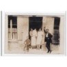 TAUXINY : carte photo du café DEBAURE (place de l'église) - très bon état