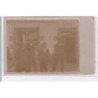 CORLAY : carte photo d'un groupe devant un café vers 1905 - bon état (un pli)