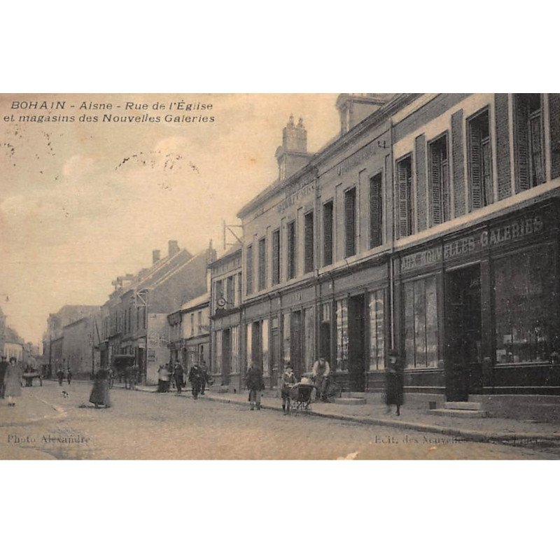 BOHAIN : rue de l'eglise et magasins des nouvelles galeries - tres bon etat