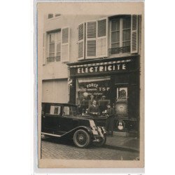 CARTE PHOTO A LOCALISER : paris(?) electricite lumiere force T-S-F réparation instalation L. Schmidt (automobile Renault