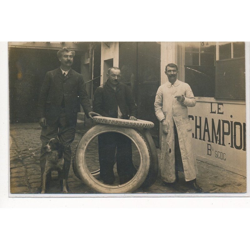 CARTE PHOTO A LOCALISER : paris(?) "le champion" pneus, automobile garage - tres bon etat