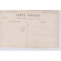 FONTAINEBLEAU : carte photo de l'arrestation d'un braconnier (posée) en foret (décembre 1912) - très bon état