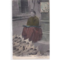 DANS LES LANDES : la marchande de sabots (rare en couleur) - très bon état