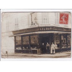 CONCHES : carte photo du magasin de modes LELOUP sur la place Carnot - état