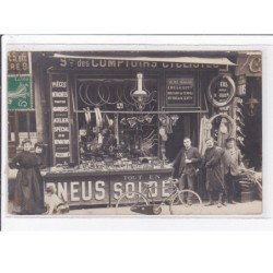 PARIS : carte photo d'un atelier de réparation et vente de pieces détachées pour vélos (société des comptoirs cyclistes)